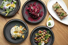 Top view of gourmet dishes on table
