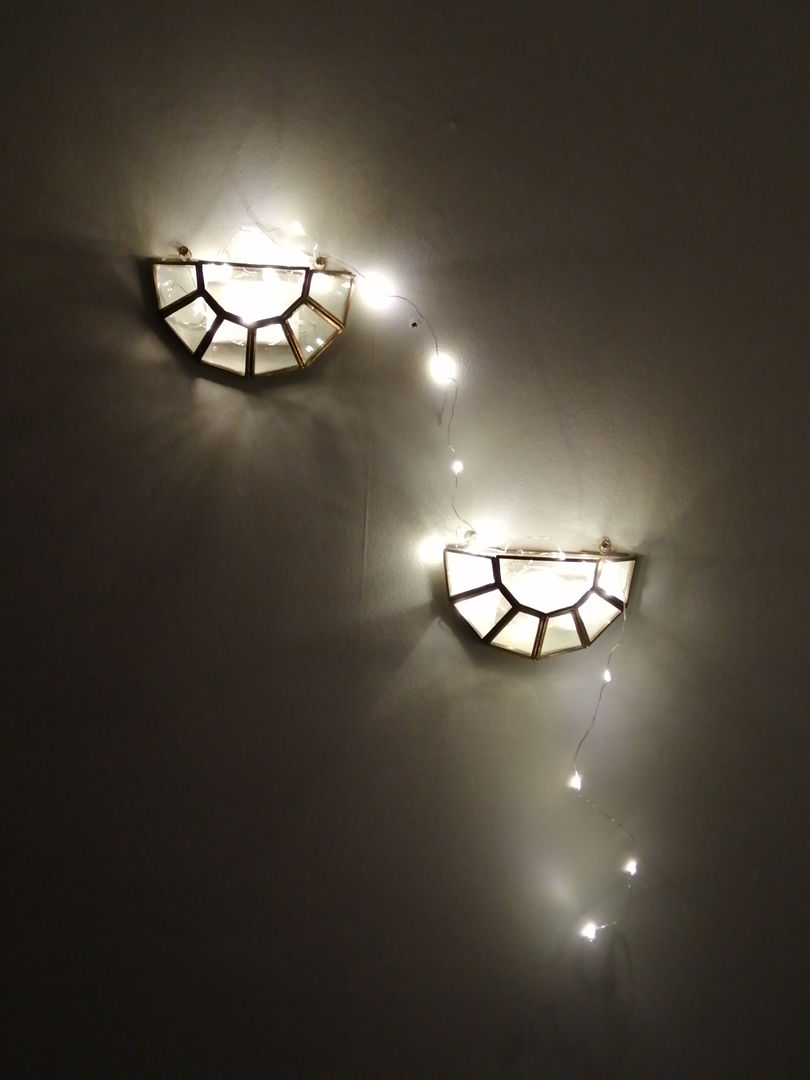 Nicola Patton Interior Design, Hampshire: Vintage Art Deco Style Galss Brass Planters Used with Fairy Lights.