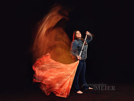 girl with orange flag