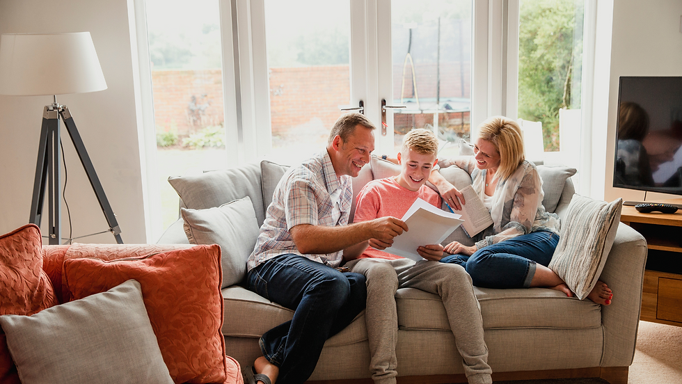 Parents opening results with their son