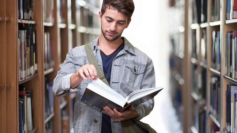 Student reading in the library