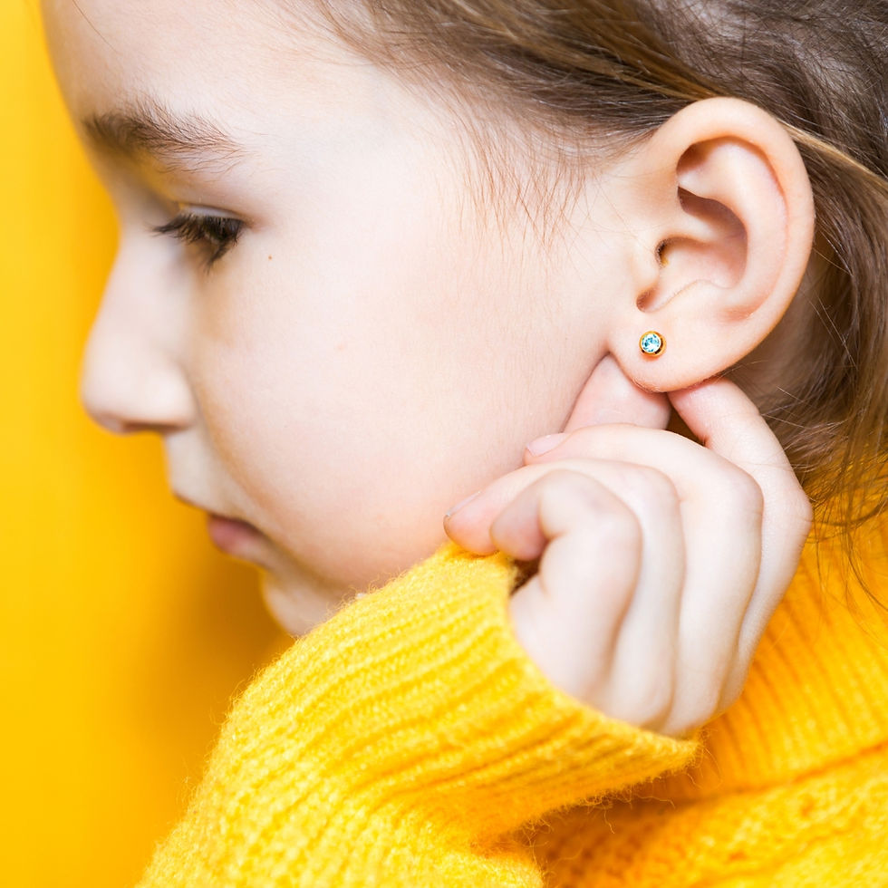 Little girl with pierced ears
