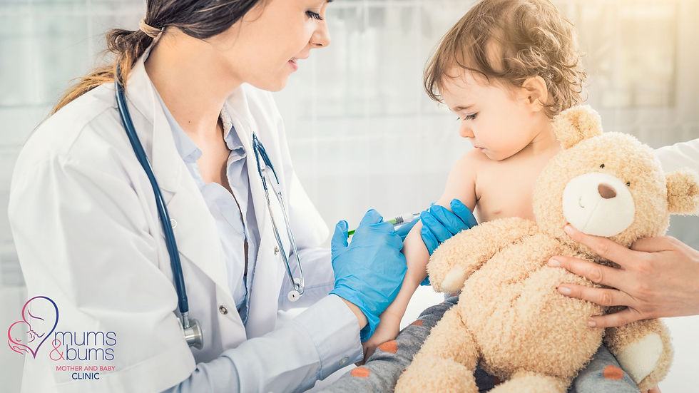Nurse giving baby vaccination while holding teddy bear | Mums & Bums, Centurion.
