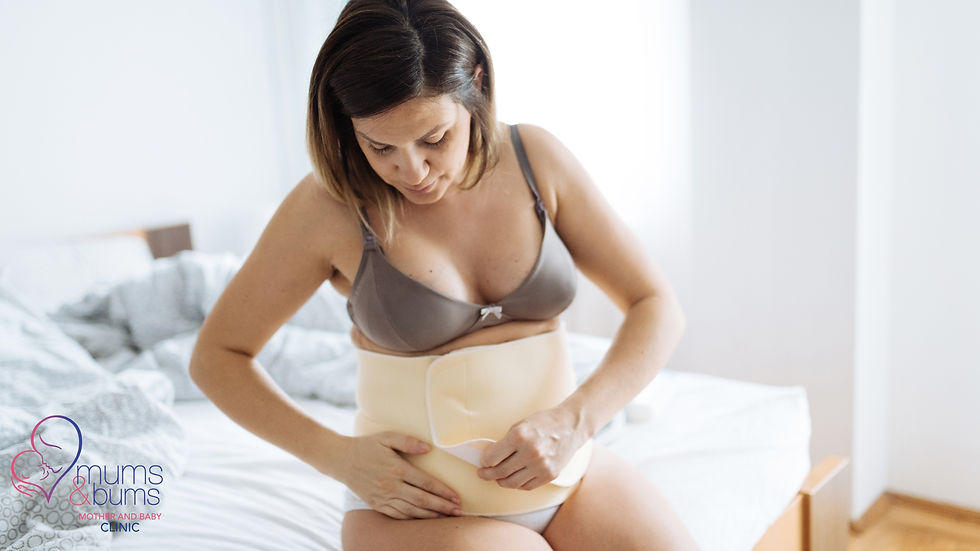 A postpartum woman with a belly binder.