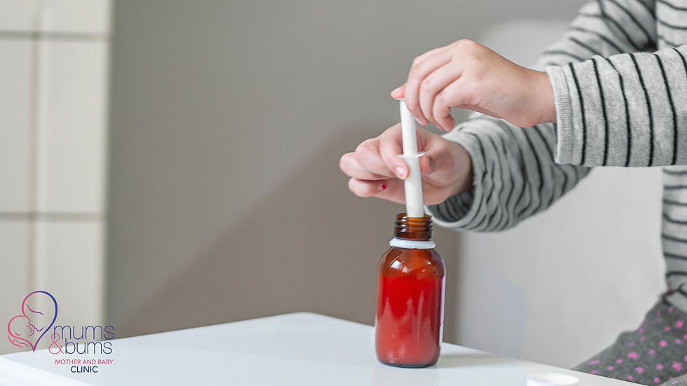 Parent drawing Pectrolyte into syringe | Mums & Bums Clinic, Centurion, South Africa.