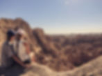 People looking over Badlands National Park