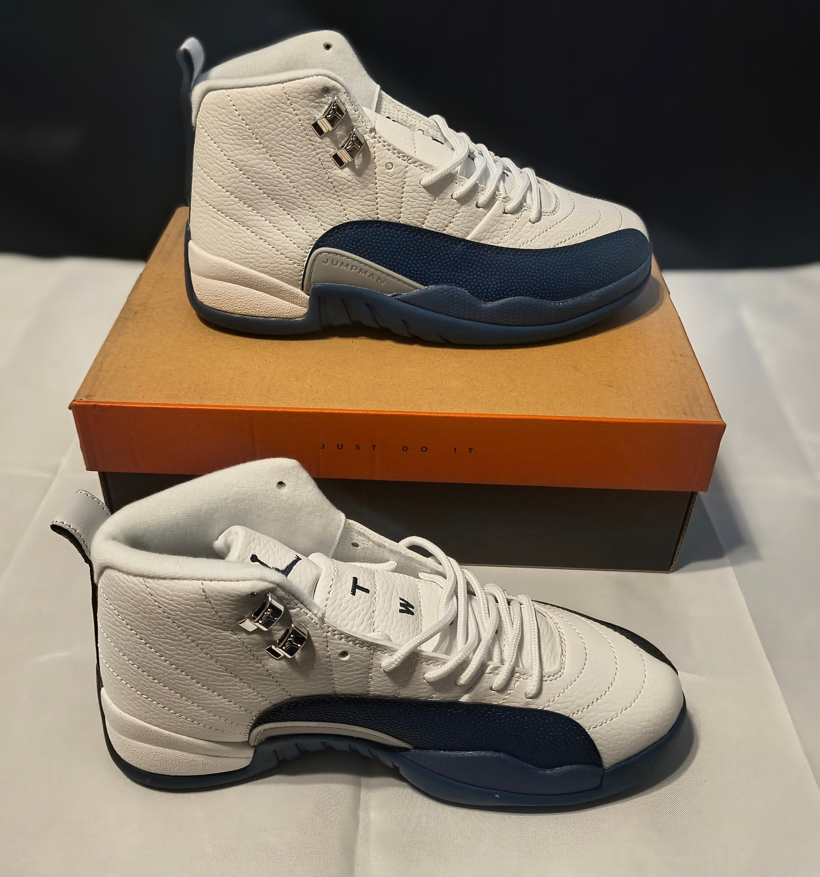 White and Blue Jordan 12s
