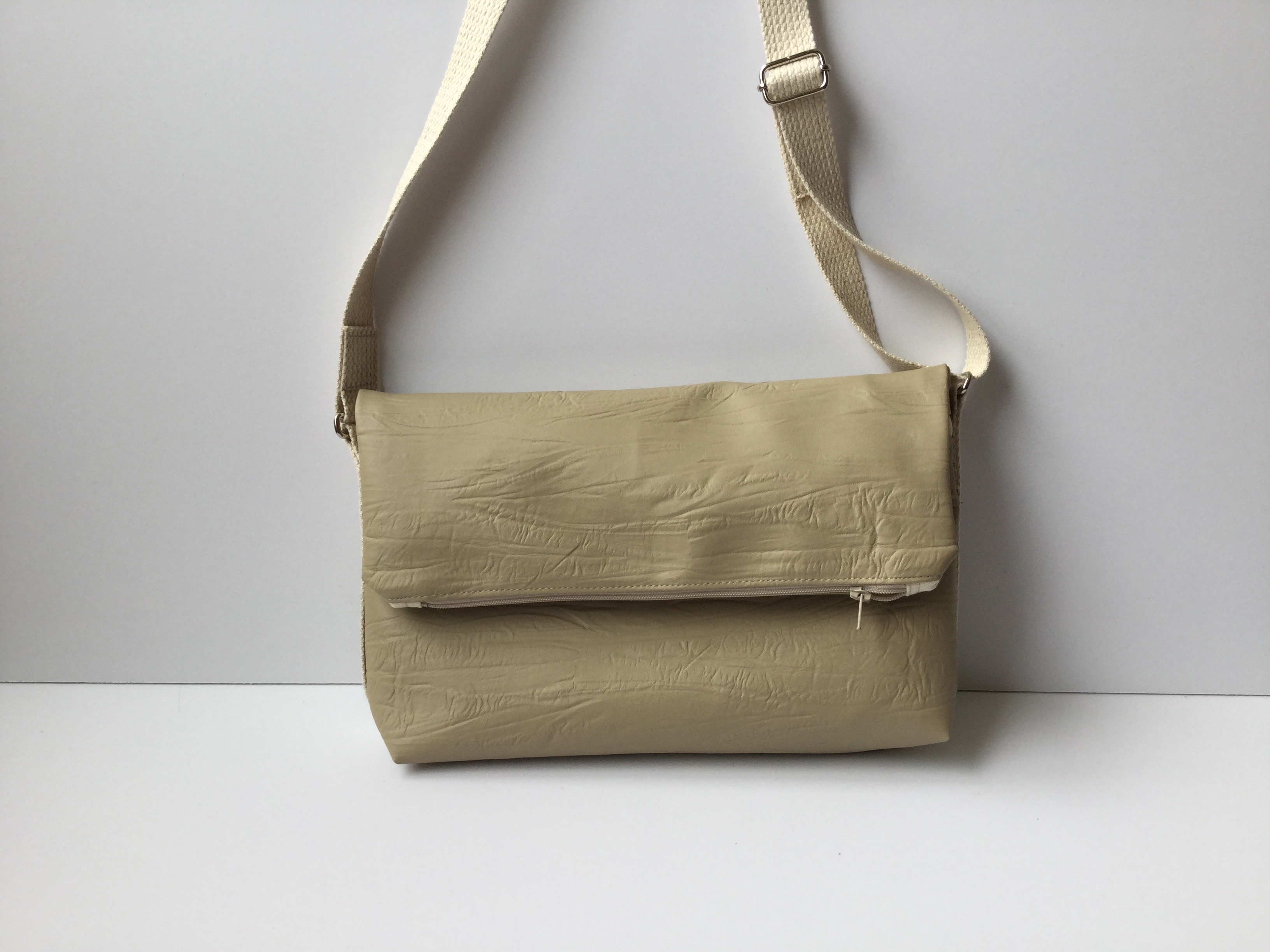 Neutral crossbody fold over
