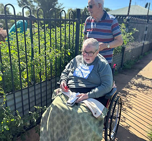 Judith Gee and John Gee in the garden.JPG
