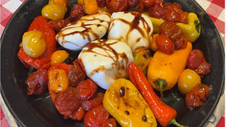 roasted tomatoes and peppers paired with creamy burrata
