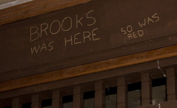 why are names important? Brooks Was Here, So Was Red, scene from the shawshank redemption. engraving names on the walls to mark owns existance