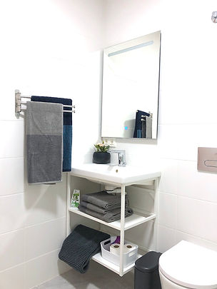 Bathroom 1 - en-suite to bedroom 1 basin and towel rail