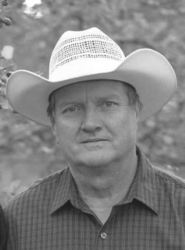 v2.0 2023 head shot marlon mormann hat b and w.jpeg