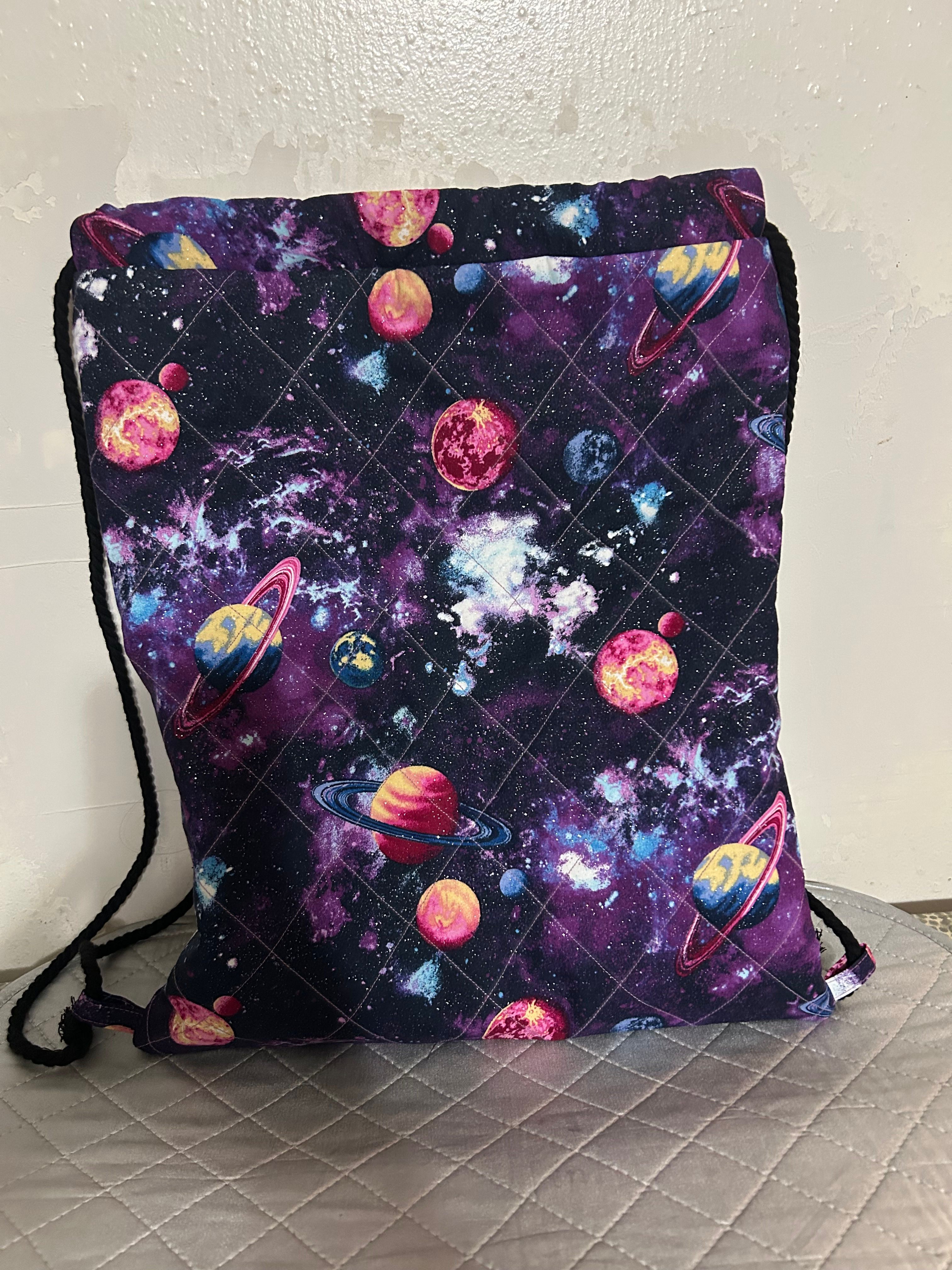 Glitter Galaxy Quilted Drawstring Backpack