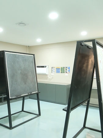 A dedicated space for hands-on application and testing of various coating systems, allowing trainees to understand techniques and performance in real-world settings.