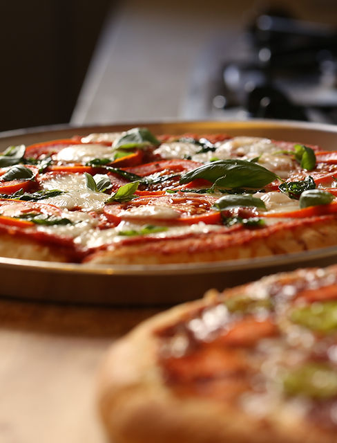 Two Fresh Pizzas