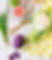 green apple, sliced of grapefruit with purple cabbage, scallions and cauliflower on table_