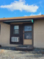 door to office spaces with awning