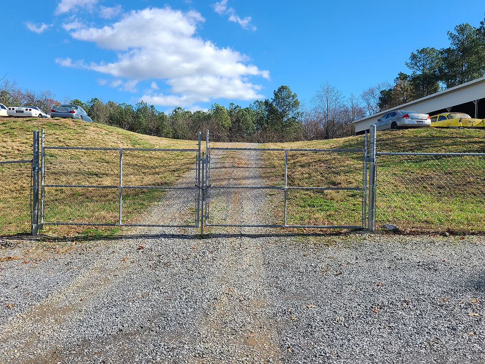 fenced in vehicle parking area