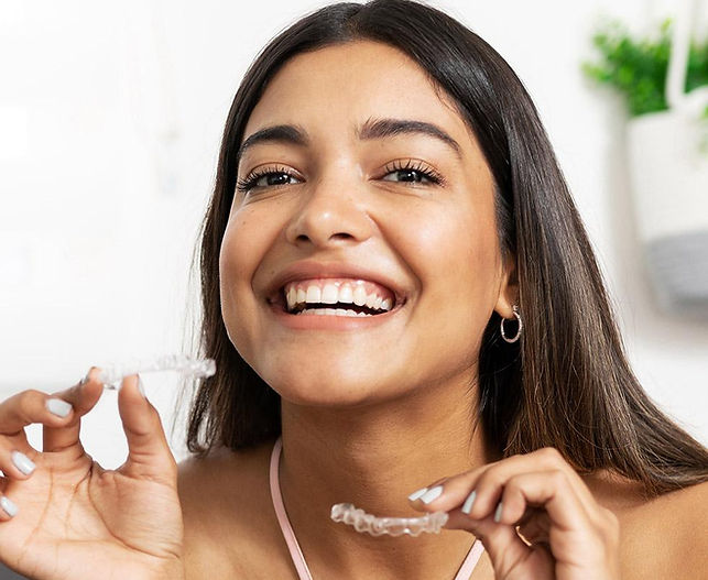 Invisalign clear aligner patient smiling at Crystal Bright Smile in Tujunga CA