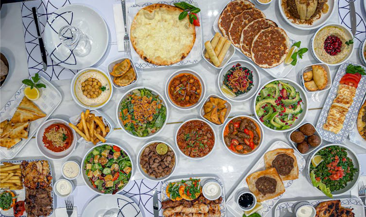 Different kinds of dishes placed on a table