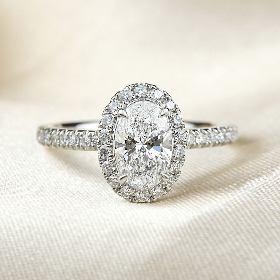 Thumbnail: Couronne · Pavé Shank Oval Cut Diamond Halo Engagement Ring | Platinum