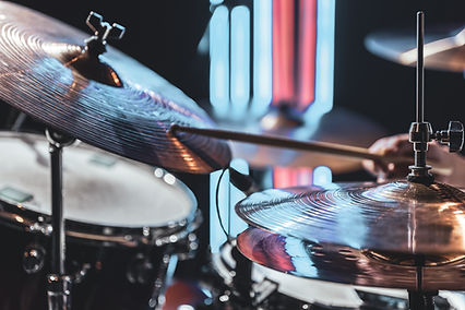 close-up-the-drummer-plays-drums-with-drum-sticks-2023-11-27-04-51-30-utc.jpg
