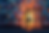 Ornate iron gates open, revealing a warm, glowing sunset. Background features a collage of colorful, abstract paintings, creating a vibrant mood.