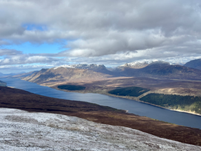 Panoramic view over Loch Ericht from the slopes between Geal Chàrn and A’ Mharconaich in the Scottish Highlands.