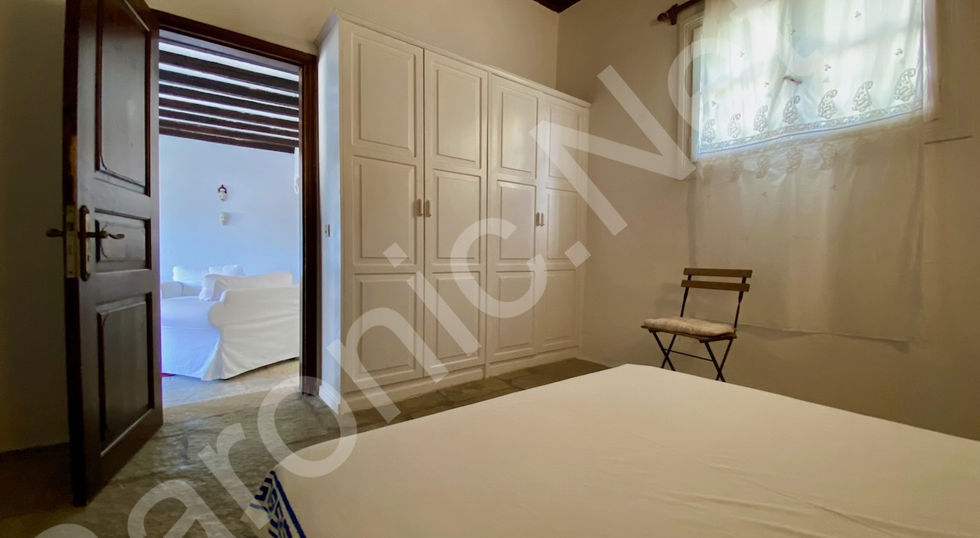 well maintained, stone built, 3 bedroom hydra house for sale with a stunning view of hydra town and harbour