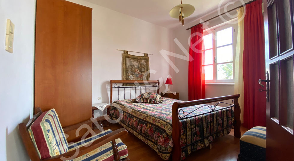 A big picture window and seating area in Bedroom 5 gives an agreeable feel