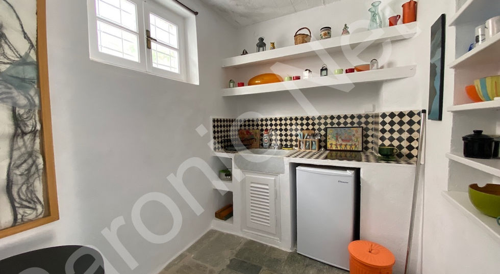 well maintained, stone built, 3 bedroom hydra house for sale with a stunning view of hydra town and harbour