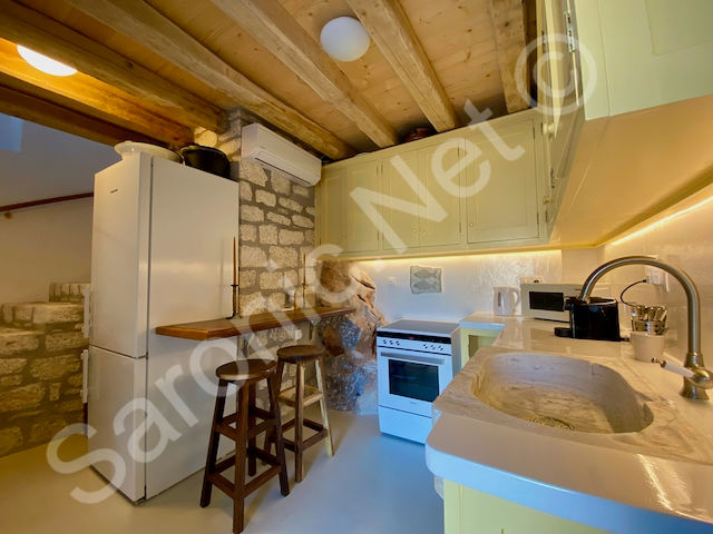  Cool and smart kitchen built into the rock with lovely features including solid stone sink, fresh built in units and all modern appliances