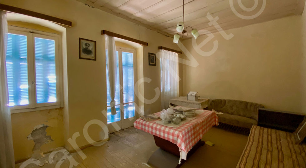 Top Floor sitting room to balcony doors