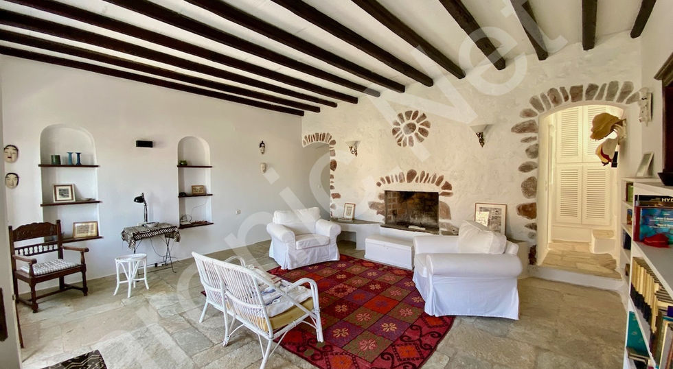 well maintained, stone built, 3 bedroom hydra house for sale with a stunning view of hydra town and harbour