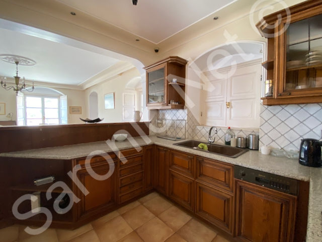 Exceptional condition fully fitted kitchen with solid wood units and unusual small shuttered window