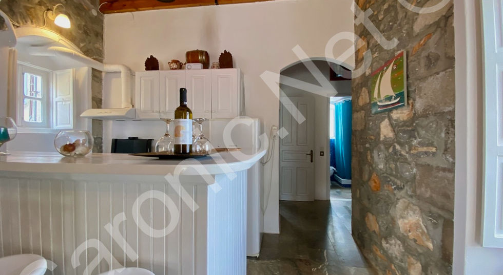 substantial, sea front, 6 bedroom house for sale in mandraki bay - premium real estate on hydra island greece