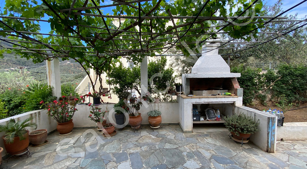 Huge outdoor entertaining terrace with and attractive brick built oven and chimney