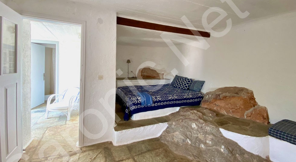 well maintained, stone built, 3 bedroom hydra house for sale with a stunning view of hydra town and harbour