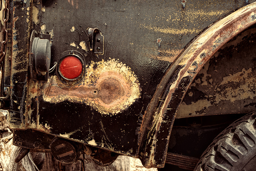 Rust patch on an old pickup reminds viewer of cartoon character