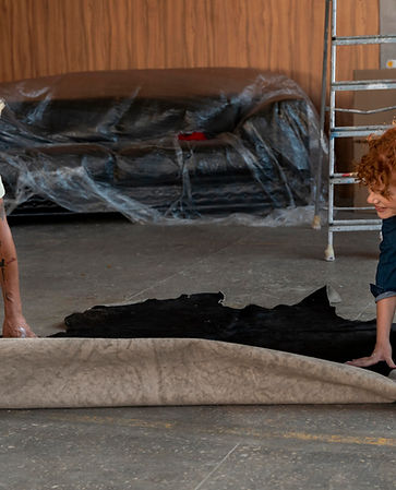 couple-handling-carpet-together-their-new-home (1).jpg