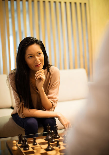 thoughtful-businesswoman-playing-chess-with-male-c-2023-11-27-05-13-55-utc (1)-min.jpg