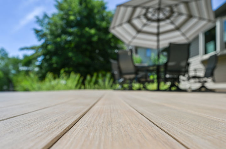 Close-up of deck railing on TimberTech Legacy Pecan and Mocha composite deck built by OnDeck