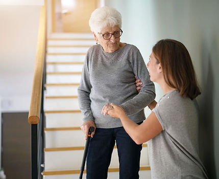 nurse helping upstairs