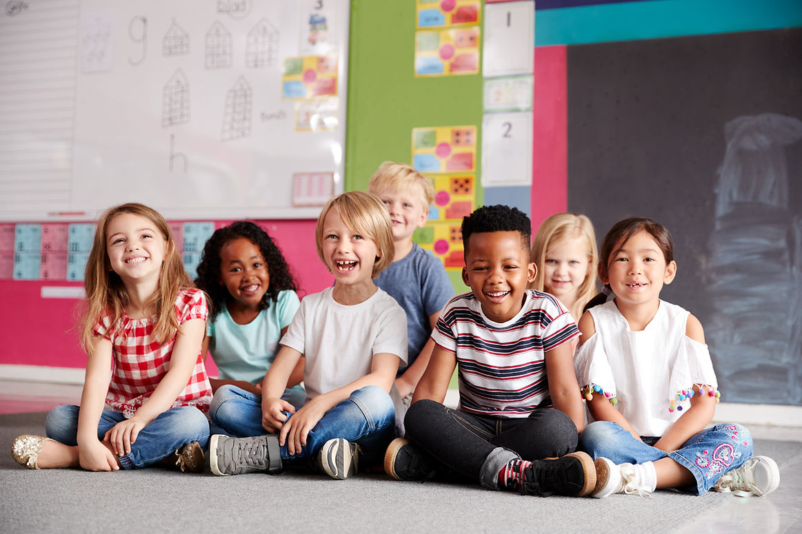 portrait-of-elementary-school-pupils-sitting-on-fl-2024-10-19-18-04-22-utc.jpg