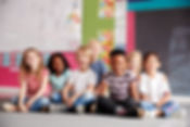 portrait-of-elementary-school-pupils-sitting-on-fl-2024-10-19-18-04-22-utc.jpg