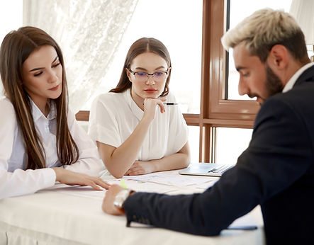 handsome-director-is-instructing-his-assistants-about-corporate-work-rules.jpg