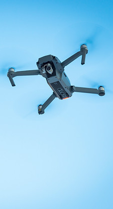 drone-flying-in-the-blue-sky-unmanned-copter