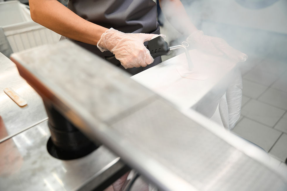 dry-cleaning-service-worker-treating-clothing-with-2023-11-27-05-29-43-utc.jpg