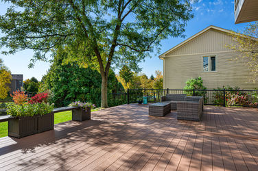 TimberTech Dark Teak composite decking with Westbury black aluminum railing built by OnDeck in Cary Illinois